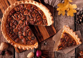 Slice of pecan pie on a dessert plate