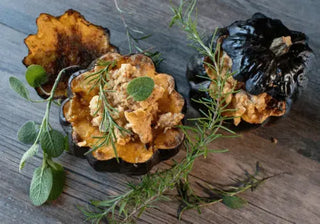 Roasted acorn squash topped with green herb sauce